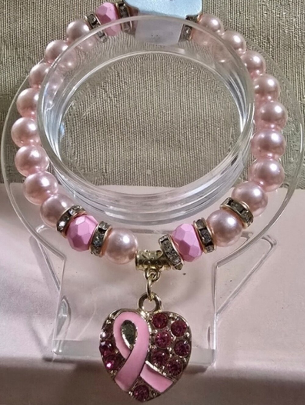 Fashion Jewelry Pink Pearl Bracelet with Heart Ribbon Charm